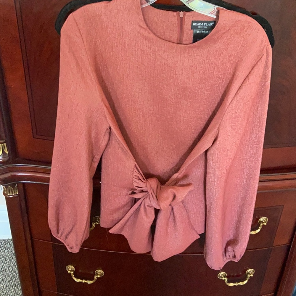 Beautiful rust blouse.